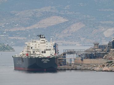 The LNG tanker CHEIKH BOUAMAMA, which departs from the Skikda LNG terminal in Algiers, unloads Algerian liquefied natural gas at the Revithoussa terminal, near Athens, in Megara, Greece, on December 1, 2025. Algeria is a critical and strategic natural gas supplier to Europe, particularly as the EU plans to phase out Russian LNG flows by 2027. (Photo by Nicolas Koutsokostas/NurPhoto via Getty Images)