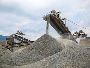 Image of heavy machinery works at the quarry.