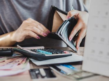 woman hand open empty purse looking for money for credit card debt, bankrupt concept