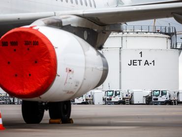 01 February 2023, Baden-Württemberg, Stuttgart: An Airbus A320 aircraft stands in front of a fuel depot filled with Jet A-1 kerosene at Stuttgart Airport. From February 5, 2023, the European Union will no longer purchase petroleum products such as diesel, gasoline or lubricants from Russia. Photo: Christoph Schmidt/dpa (Photo by Christoph Schmidt/picture alliance via Getty Images)