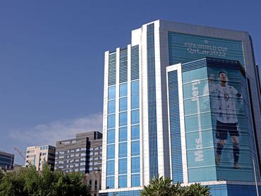 DOHA, QATAR - NOVEMBER 17: A giant image of Lionel Messi of Argentina is seen on a building in Doha ahead of the FIFA World Cup Qatar 2022 at  on November 17, 2022 in Doha, Qatar. (Photo by Christopher Lee/Getty Images )