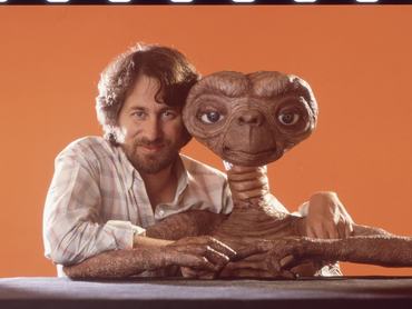 Director Steven Spielberg poses with E.T. at Carlo Rimbaldi studio in April, 1982 in Los Angeles, California. (Photo by Mark Sennet/Getty Images)