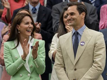 LONDON, ENGLAND - JULY 4. Roger Federer of Switzerland is applauded by HRH Catherine, Princess of Wales, after arriving at the Centre Court's Royal Box to a standing ovation during the Wimbledon Lawn Tennis Championships at the All England Lawn Tennis and Croquet Club at Wimbledon on July 04, 2023, in London, England. (Photo by Tim Clayton/Corbis via Getty Images)