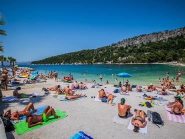 People enjoy on the Kasjuni beach during the heatwave, in Split, Croatia, on July 16, 2023.(Photo: Zvonimir Barisin/PIXSELL/DeFodi Images via Getty Images)