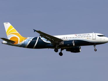 COPENHAGEN, DENMARK - 2024/05/22: A Croatia Airlines (Trade Air) Airbus 320 landing at Copenhagen Kastrup airport. Trade Air is a Croatian charter airline based in Zagreb and specialized in ACMI and charter flights. Trade Air fleet consists of four Airbus A320s and one Airbus A319. (Photo by Fabrizio Gandolfo/SOPA Images/LightRocket via Getty Images)