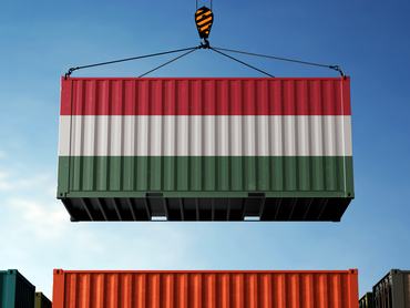 Hungary trade cargo container hanging against clouds background