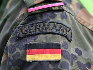 17 July 2024, Thuringia, Erfurt: The words "Germany" and the German flag can be seen on the uniform of a soldier during the visit of the Federal Minister of Defense to the Bundeswehr Logistics Command in the Löberfeld barracks in Erfurt. Here he was informed about the capabilities of the troops. Photo: Martin Schutt/dpa (Photo by Martin Schutt/picture alliance via Getty Images)