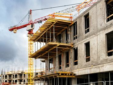 New residential house construction site. Industry and investment in Europe, house development