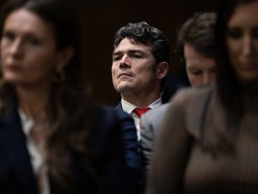UNITED STATES - JANUARY 30: Joe Kent, a former congressional candidate from Washington state, listens to testimony by Tulsi Gabbard, President Donald Trump's nominee to be Director of National Intelligence, during her Senate Select Intelligence Committee confirmation hearing in Dirksen building on Thursday, January 30, 2025. (Tom Williams/CQ-Roll Call, Inc via Getty Images)