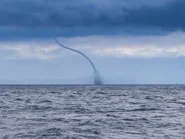 Dangerous waterspout on open sea in Dalmatia, Croatia. Distance half mile away.