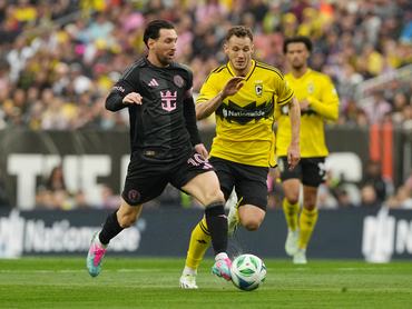 CLEVELAND, OHIO - APRIL 19: Lionel Messi #10 of Inter Miami CF controls the ball whilst under pressure from Daniel Gazdag #8 of Columbus Crew during the MLS match between Columbus Crew and Inter Miami CF at Huntington Bank Field on April 19, 2025 in Cleveland, Ohio. (Photo by Jason Mowry/Getty Images)