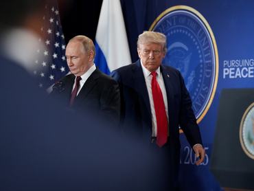 U.S. President Donald Trump (R) and Russian President Vladimir Putin arrive for a press conference at Joint Base Elmendorf-Richardson on August 15, 2025 in Anchorage, Alaska. The two leaders are meeting for peace talks aimed at ending the war in Ukraine. (Photo by Andrew Harnik/Getty Images)