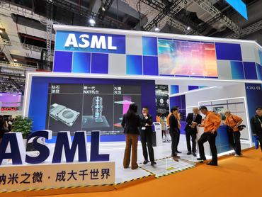 SHANGHAI, CHINA - NOVEMBER 06 2025: People visit the booth of ASML during the China International Import Expo in Shanghai, China Thursday, Nov. 06, 2025. (Photo credit should read TANG KE / Feature China/Future Publishing via Getty Images)