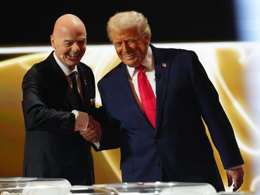 WASHINGTON, DC - DECEMBER 05: Gianni Infantino, President of FIFA, shakes hands with U.S. President Donald Trump during the FIFA World Cup 2026 Official Draw at John F. Kennedy Center for the Performing Arts on December 05, 2025 in Washington, DC. (Photo by Jia Haocheng - Pool/Getty Images)