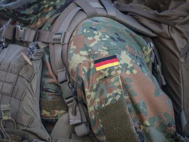 WILHELMSHAVEN, GERMANY - JANUARY 19: A German flag on the uniform of a new recruit of the German Navy (Marine)  during basic training at the naval base on January 19, 2026 in Wilhelmshaven, Germany. The Bundeswehr, the German armed forces, is seeking to modernize its capabilities and also add 60,000 new personnel in response to what German leaders see as a growing threat from Russia. (Photo by Focke Strangmann/Getty Images)