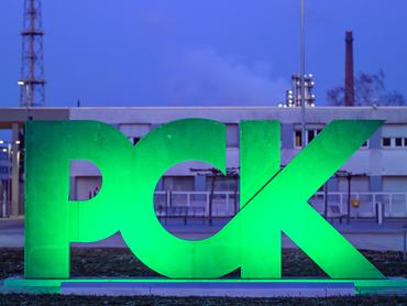 PRODUCTION - 21 January 2026, Brandenburg, Schwedt/Oder: The logo of PCK-Raffinerie GmbH. The refinery in Schwedt in the Uckermark region in north-eastern Brandenburg supplies large parts of north-eastern Germany with fuel. PCK Schwedt is majority-owned by the Russian state-owned company Rosneft, whose shares have been under trusteeship of the German government since 2022 due to the war in Ukraine to ensure security of supply, which has been extended until March 2026; in addition to Rosneft, Shell (now sold to Prax) and Eni hold shares that are also in flux. Photo: Patrick Pleul/dpa (Photo by Patrick Pleul/picture alliance via Getty Images)