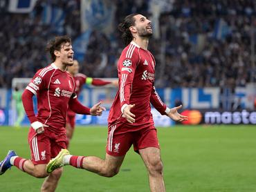 MARSEILLE, FRANCE - JANUARY 21: Dominik Szoboszlai of Liverpool celebrates his goal with Milos Kerkez (left) during the UEFA Champions League 2025/26 League Phase MD7 football match between Olympique de Marseille (OM) and Liverpool FC at Velodrome stadium on January 21, 2026 in Marseille, France. (Photo by Jean Catuffe/Getty Images)