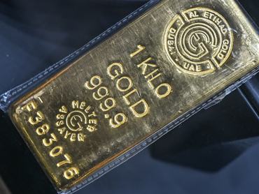 DOHA, QATAR - FEBRUARY 18: A one-kilogram bar of 999.9 fine gold from Al Etihad Gold Refinery is displayed at the Doha Gold Souq on February 18, 2026, in Doha, Qatar. (Photo by STR/NurPhoto via Getty Images)