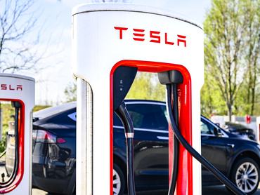 Tesla Model X electric car at a Tesla supercharger charging station in Zwolle, The Netherlands. The supercharger network is an electric vehicle fast charging network built and operated by American vehicle manufacturer Tesla, Inc.