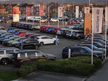 WESTON-SUPER-MARE, UNITED KINGDOM - MARCH 19: New and second hand used cars that are displayed for sale outside a dealership on March 19, 2026 in Weston-super-Mare, England. The sale of new and used cars is seen as a indicator of a healthy economy with many sellers offering competitive PCP (personal contract plans) or other forms of finance to incite buyers. However financial regulators such as the FCA (Financial Conduct Authority) have been examining historic car finance agreements following claims that some buyers were overcharged through unfair commission levies. (Photo by Anna Barclay/Getty Images)
