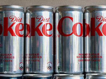 Diet Coke cans are displayed for sale in a market in Srinagar, Jammu and Kashmir, on April 22, 2026. The conflict involving Iran has led to a shortage of Diet Coke in India, where it is sold only in aluminum cans that have become scarce due to delayed shipments from the Gulf. The Gulf region accounts for around 9% of global aluminum production, which has been affected since the end of February by disruptions in the Strait of Hormuz, according to Reuters. (Photo by Firdous Nazir/NurPhoto via Getty Images)