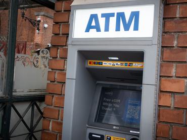An ATM is mounted on a wall near the lower station of the Buda Castle Funicular (Budavari Siklo) in Budapest, Hungary, on April 10, 2026. (Photo by Mateusz Wlodarczyk/NurPhoto via Getty Images)