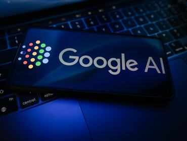 POLAND - 2026/05/11: In this photo illustration, a Google AI logo is seen displayed on a smartphone on the top of a laptop. (Photo Illustration by Omar Marques/SOPA Images/LightRocket via Getty Images)