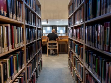BUDAPEST, HUNGARY - MAY 14: A student conducts research at the Budapest site of Central European University (CEU Budapest) on May 14, 2026 in Budapest, Hungary. The non-profit private university moved its main campus to Vienna in 2019 after being forced out by the government of then-Prime Minister Viktor Orban, which passed a higher education law targeting the university and its founder, billionaire philanthropist George Soros. Hungary is entering a new political era after the defeat of Viktor Orban, the architect of a self-described "illiberal democracy" who led the country for 16 years. Peter Magyar, leader of Hungary's center-right Tisza Party, was sworn in as the new prime minister on May 9, 2026. (Photo by John Moore/Getty Images)