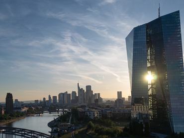 25 May 2026, Hesse, Frankfurt/Main: After a hot day, the sun sets behind the ECB's headquarters, refracted in the building's glass façade. Photo: Boris Roessler/dpa (Photo by Boris Roessler/picture alliance via Getty Images)