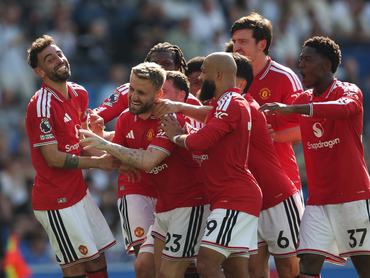 BRIGHTON, ENGLAND - MAY 24: Bruno Fernandes of Manchester United celebrates scoring his team's third goal with teammates during the Premier League match between Brighton & Hove Albion and Manchester United at the Amex Stadium on May 24, 2026 in Brighton, England. (Photo by Steve Bardens/Getty Images)