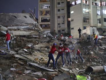 CARACAS, VENEZUELA - JUNE 24: Responders arrive to a demolished building at San Bernardino after a magnitude 7.2 earthquake struck Venezuela and other regions in the Caribbean on June 24, 2026 in Caracas, Venezuela. According to the U.S. Geological Survey (USGS), the main earthquake was followed by a 7.5-magnitude aftershock less than a minute later; although some buildings collapsed, the number of victims remains unknown. (Photo by Jesus Vargas/Getty Images)