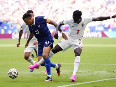 Kylian Mbappe of France and Bukayo Saka of England compete for the ball during the FIFA World Cup 2026 Bronze Medal Match match between France and England at Miami Stadium on July 18, 2026 in Miami Gardens, United States. (Photo by Jose Breton/Pics Action/NurPhoto via Getty Images)