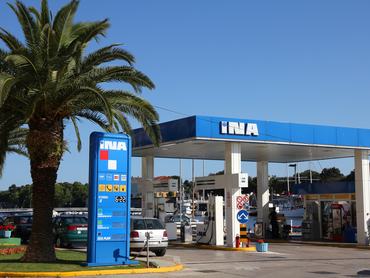 "Zadar, Croatia - June 22, 2011: INA gas station on June 22, 2011 in Zadar, Croatia. INA is the largest company in Croatia with its 25bn HRK revenue for 2010."