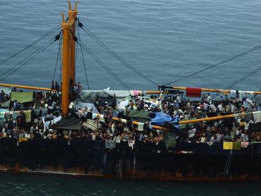 Vietnamese Refugees aboard Tung An. Manila, Philippines: Panamanian registered freighter with 2,700 Vietnamese refugees from fallen South Vietnam anchored on Manila Bay after Philippine authorities refused to allow them to disembark from Tung An ship. The Vietnam however, can no longer be accomodated at the Fabella refugee center in Manila where more than 3,000 refugees have been housed.