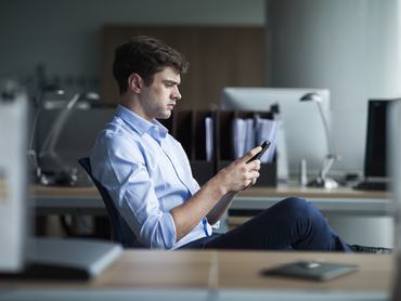 Businessman working on phone