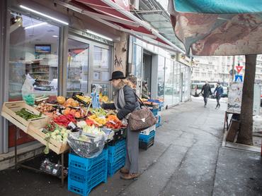 BUCHAREST, ROMANIA - FEBRUARY 07:  A woman looks at fruit and vegetables displayed outside a shop in central Bucharest on February 7, 2017 in Bucharest, Romania. Romania's ruling Social Democrats has appealed for calm following the largest demonstrations in Romania since the fall of communism in 1989. Protests were called after the government tried to introduce a decree that was widely condemned as reversing the country's anti-corruption drive. On Sunday, following a week of nightly protests, the government rescinded the decree, which would have shielded dozens of politicians from prosecution however protesters again took to the streets to demand the government's resignation.  (Photo by Matt Cardy/Getty Images)