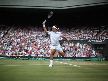 LONDON, ENGLAND - JULY 16: Roger Federer of Switzerland in action against Marin Cilic of Croatia during the Gentlemen's Singles final of the Wimbledon Lawn Tennis Championships at the All England Lawn Tennis and Croquet Club at Wimbledon on July 16, 2017 in London, England. (Photo by Tim Clayton/Corbis via Getty Images)