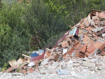 Building waste illegally fly tipped in Teos, Western Turkey. (Photo by Ashley Cooper/Construction Photography/Avalon/Getty Images)