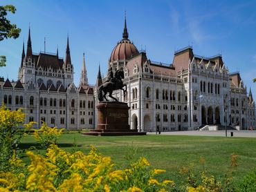 Budapest, Hungary- July 13, 2024: The II. Rákóczi Ferenc equestrian statue is a centerpiece of Kossuth Square, framed by the Hungarian Parliament and greenery. This iconic statue honors a Hungarian national hero.