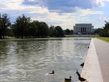 Washington, DC, USA - August 26, 2025: large reflecting pool with the Lincoln Memorial at the far end