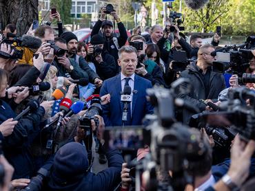 BUDAPEST, HUNGARY - APRIL 12: (EDITOR'S NOTE: Alternate crop) Peter Magyar, lead candidate of the Tisza party, speaks to media after casting his vote in Hungarian parliamentary elections at a polling station on April 12, 2026 in Budapest, Hungary. Hungarian Prime Minister Viktor Orban, who has been in power for 16 years, is currently trailing against his main opponent Peter Magyar in polls. (Photo by Janos Kummer/Getty Images)
