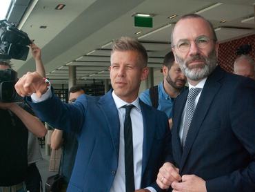 14 June 2024, Hungary, Budapest: Manfred Weber (r), EPP leader, and Orban's challenger Peter Magyar stand on the roof of the Hilton Hotel and look out over the city. They held talks about Magyar's Tisza party joining the EPP group in the EU Parliament. Photo: Kathrin Lauer/dpa (Photo by Kathrin Lauer/picture alliance via Getty Images)
