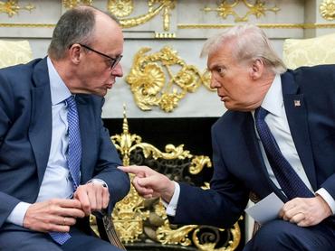 FILE PHOTO: U.S. President Donald Trump and German Chancellor Friedrich Merz meet in the Oval Office at the White House in Washington, D.C., U.S., March 3, 2026.  REUTERS/Jonathan Ernst//File Photo