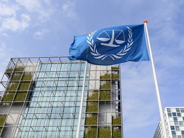 Den Haag, Netherlands, 29.03.2022:  Flag with the logo of the of the International Criminal Court (ICC) on March 29, 2022 in Den Haag, Netherlands. (Photo by Alex Gottschalk/DeFodi Images via Getty Images)