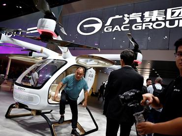 A GAC GOVY AirCab flying car on display at the GAC Group booth, during the Beijing International Automotive Exhibition, or Auto China, in Beijing, China April 24, 2026. REUTERS/Tingshu Wang