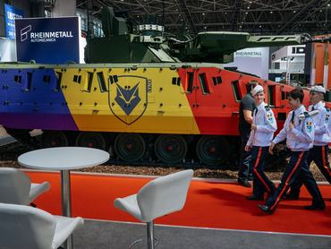 BUCHAREST, ROMANIA - MAY 15: Cadets walk past a Rheinmetall LYNX IFV Next-Tracked Vehicle on display at the Black Sea Defense, Aerospace And Security (BSDA) exhibition on May 15, 2026 in Bucharest, Romania. The exhibition, which was established in 2007 and is held every two years, brings together suppliers and users across land, air, sea, homeland, cyber, and space-defense sectors. (Photo by Andrei Pungovschi/Getty Images)