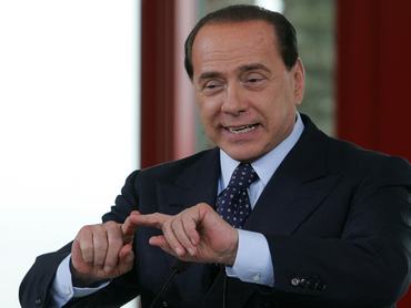 PORTO ROTONDO, ITALY - APRIL 18:  Italian Prime Minister-elect Silvio Berlusconi attends a joint press conference with Outgoing Russian President Vladimir Putin at Berlusconi's private summer residence villa 'La Certosa' on April 18, 2008 in Porto Rotondo, near Olbia, Italy. The meeting focused on developing bilateral relations with discussions on energy and the Italian Alitalia airline on the agenda.  (Photo by Artyom Korotayev/Epsilon/Getty Images)