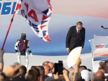 Serbian President Aleksandar Vucic stands on stage during a major rally organised by Serbia's ruling Serbian Progressive Party (SNS) in Belgrade, Serbia, June 27, 2026. REUTERS/Djordje Kojadinovic