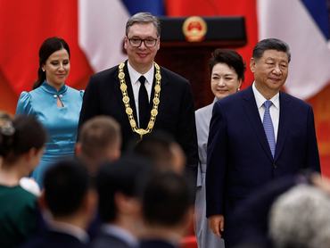 Chinese President Xi Jinping, his wife Peng Liyuan, Serbian President Aleksandar Vucic and his wife Tamara Vucic leave after an awarding ceremony for Friendship Medal of the People's Republic of China, at the Great Hall of the People, in Beijing, China May 25, 2026. REUTERS/Tingshu Wang/Pool