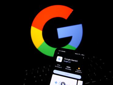 The Google Gemini logo appears on a phone, and the Google logo is displayed on a laptop in Krakow, Poland, on April 1, 2025. (Photo by Klaudia Radecka/NurPhoto via Getty Images)
